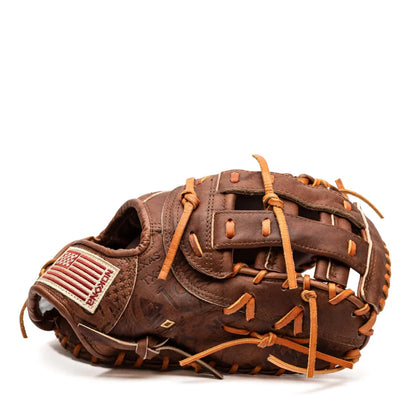 Nokona Walnut EP 13″ First Base Mitt: W-EPN70 in Walnut Crunch leather with tan lacing and a rectangular American flag patch on the wrist strap.