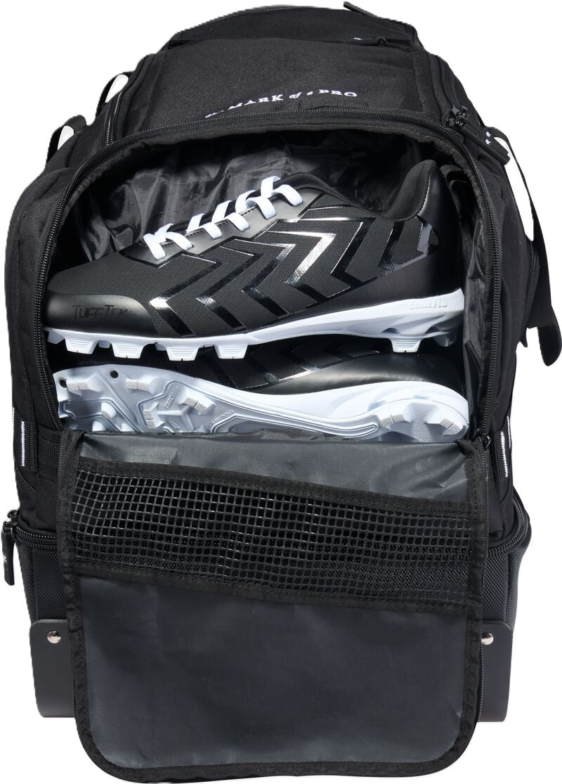 A black Rawlings Yadi 2 Luggage Wheeled Catcher’s Bag: YADI2LUGG with an open compartment containing a pair of black and white baseball cleats.