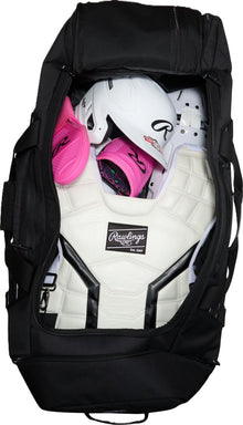 Black Rawlings Yadi 2 Luggage Wheeled Catcher’s Bag: YADI2LUGG packed with a white catcher’s chest protector, a white batting helmet, and pink batting gloves.