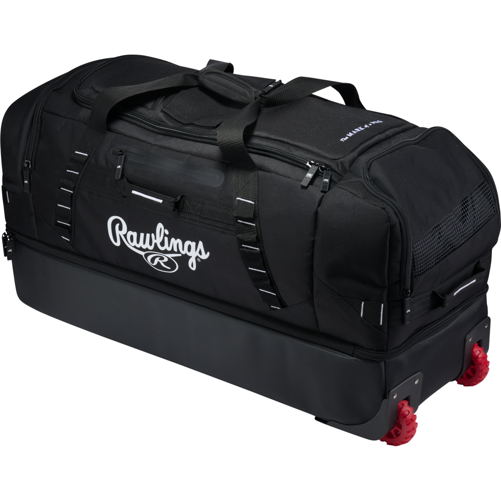 Large black Rawlings Yadi 2 Luggage Wheeled Catcher’s Bag with red wheels and multiple external storage compartments.