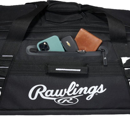 Black Rawlings Yadi 2 Luggage Wheeled Catcher’s Bag with a small zippered front pocket containing a smartphone, car key fob, and leather wallet.