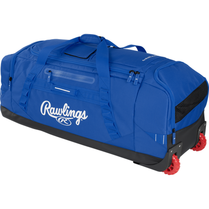 The Rawlings Yadi 2 Wheeled Catcher's Bag (YADI2WHBG) in royal features handles, side pockets, a clear ID slot, and red wheels on one end for easy transport.