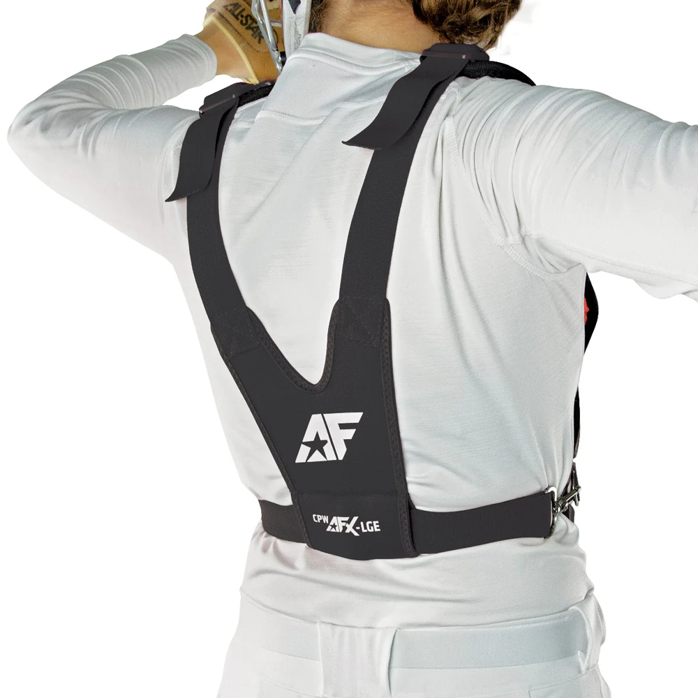 A person in a white outfit is seen from behind adjusting an All Star AFx Fastpitch Catcher's Chest Protector (CPW-AFX), which features AF and AFX-LGE logos, contoured fit, and adjustable shoulder and waist straps for comfort.