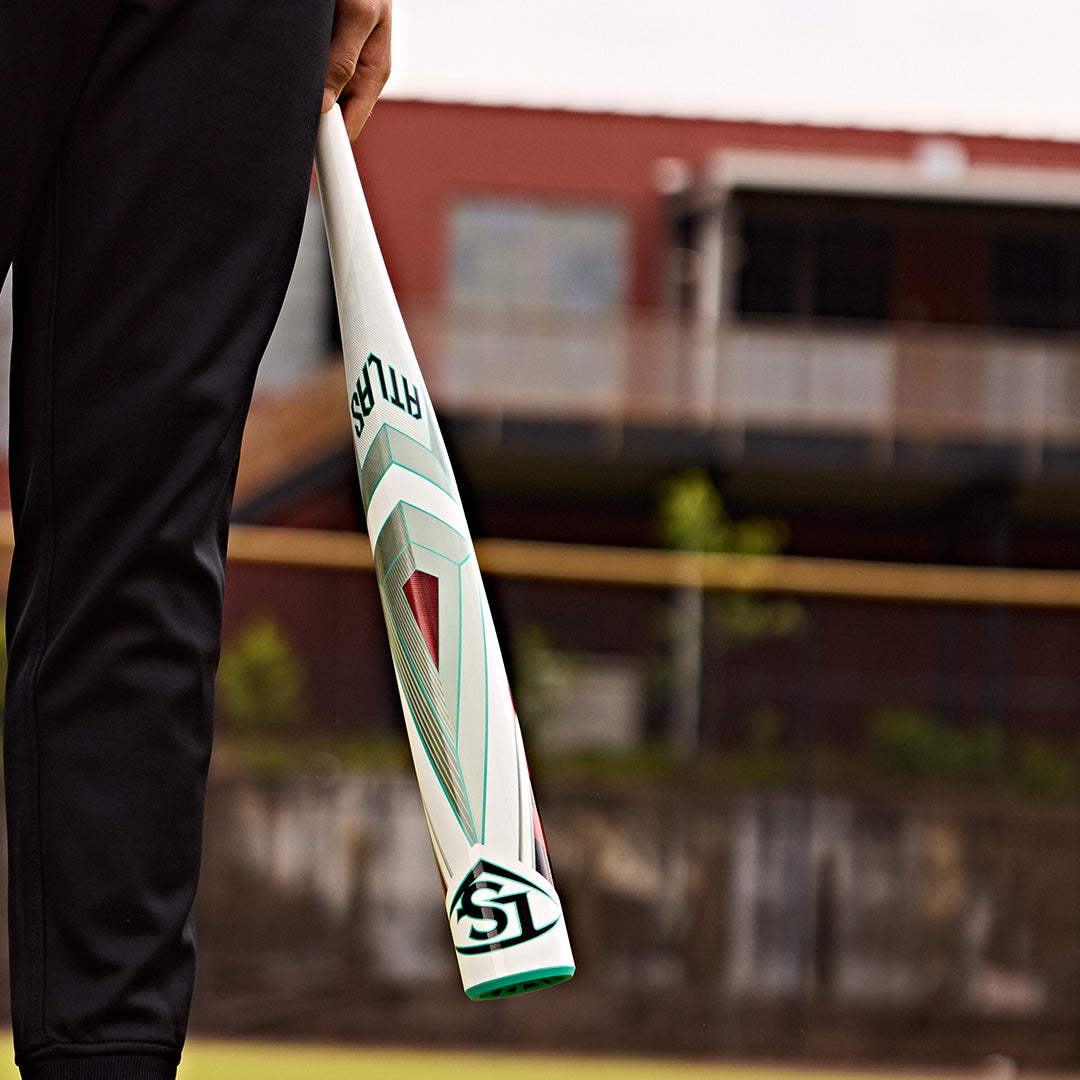 A person holding a Louisville Slugger 2025 Atlas (-5) 2 5/8" USSSA Baseball Bat (WBL2981010).