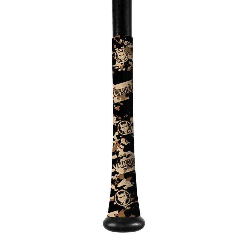 A close-up of a black bat handle wrapped in VukGripz Bat Grip Tape by VukGripz, featuring a camouflage pattern and circular logo for optimal grip. The handle is visible at the top and bottom.