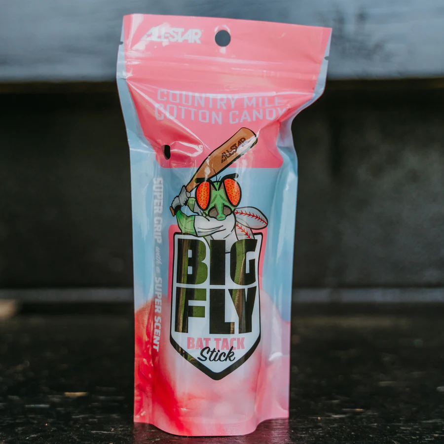 A pink and blue resealable All Star Big Fly Bat Tack Stick (BFST1) pouch features a cartoon baseball, strawberries, and bat. The upright pouch has Country Mile Cotton Candy flavor and is ideal for All-Star bat grip.