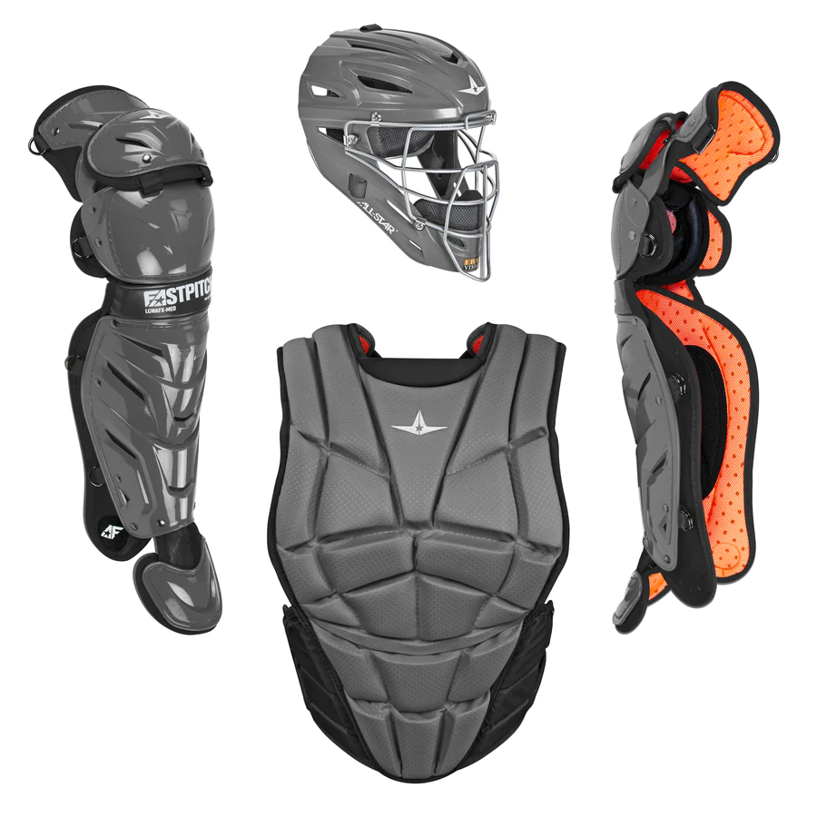 Four pieces of grey All Star fastpitch softball gear: a helmet with face mask, the All Star AFx Catcher's Chest Protector (CPW-AFX) for women, and two leg guards—one shown front, one back with orange padding.
