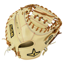 A light tan All Star Pro-Elite Japan 34″ Catcher’s Mitt (CM3000-J2-34) with brown laces, black and yellow All Star branding, and “Pro Elite” stitched on the side. Made from premium HIMEJI leather, this Pro-Elite Japan Series mitt features an open web design and appears new and unused.