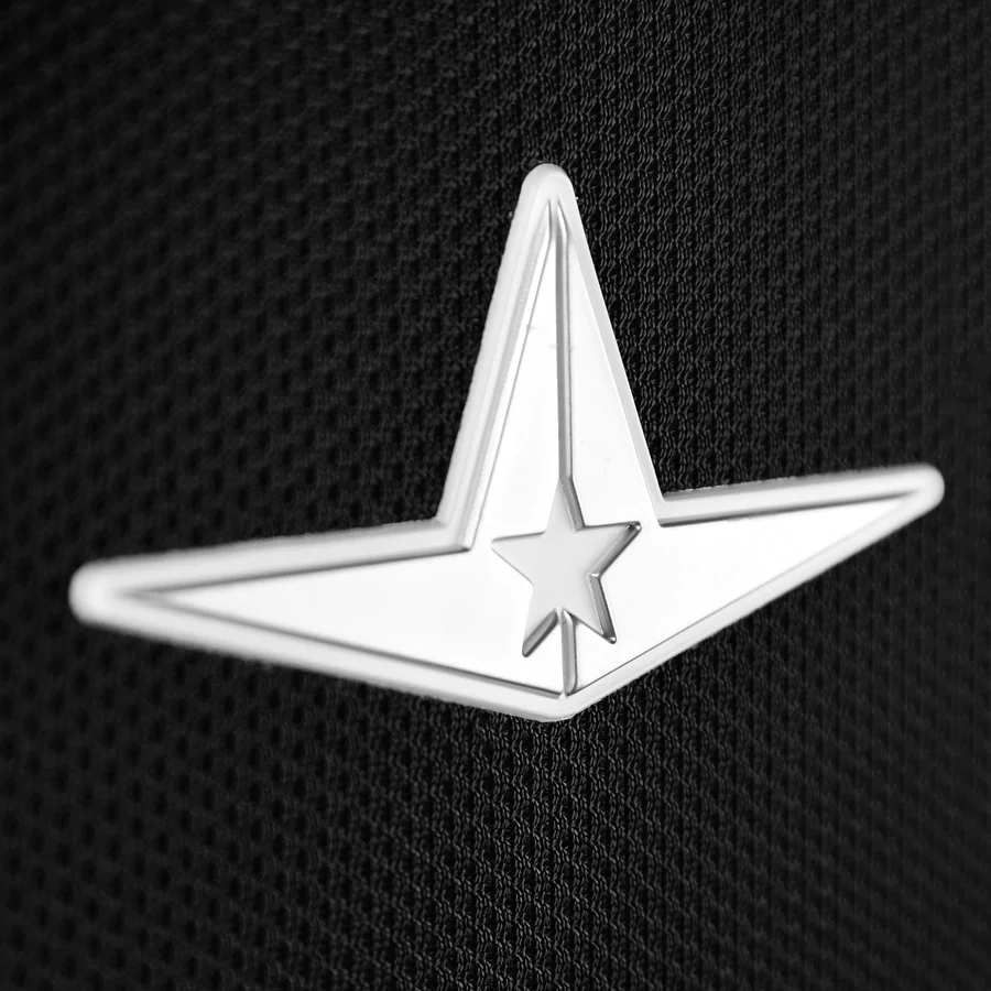 The All Star Top Star Catcher's Chest Protector (CPCC-TS) features a metallic, star-shaped emblem with two pointed wings on a textured black background, echoing the premium design found on top chest protectors by All Star.