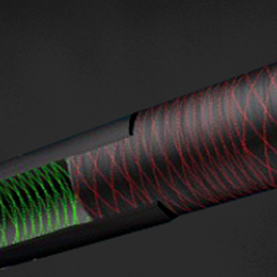 A close-up of a cylindrical object with black surface, featuring green crisscross lines on the left section and red crisscross lines on the right section, against a dark background.