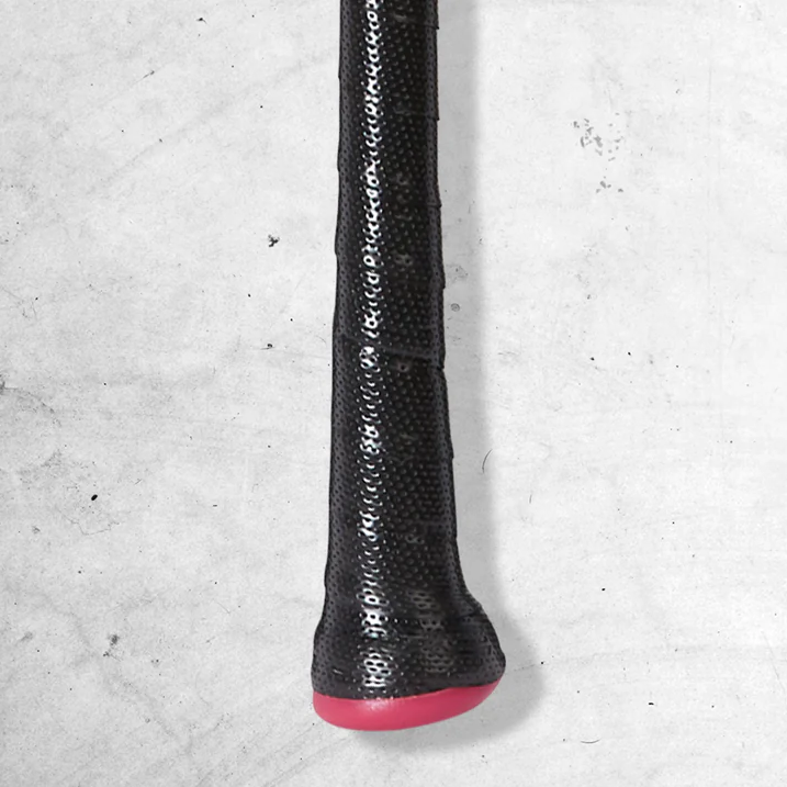 Close-up of the black textured handle of a sports bat, featuring a red knob at the end, set against a light gray, slightly textured background.