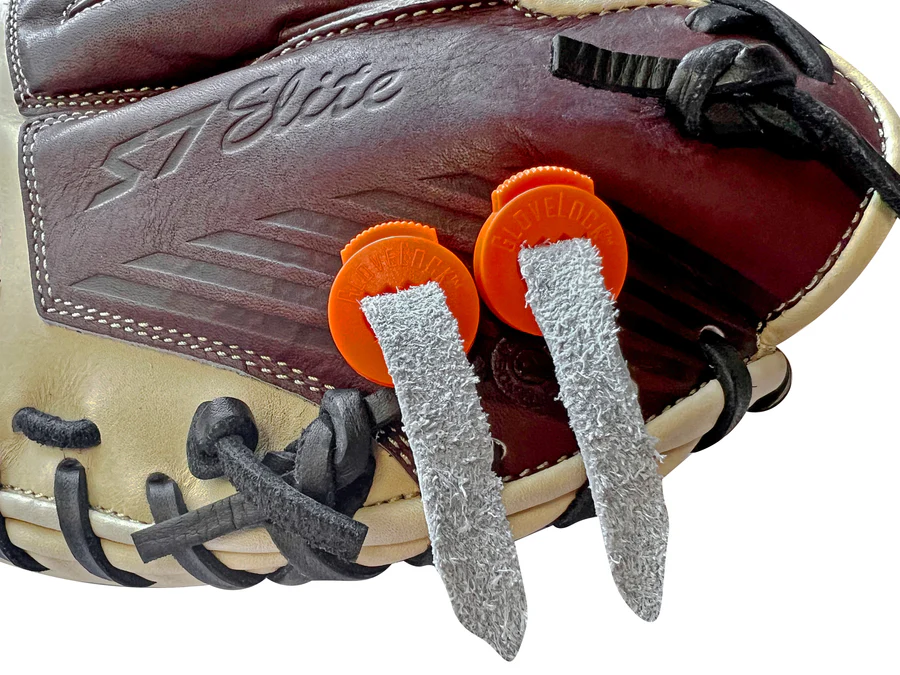 A close-up of an All Star GloveLock (4 Pack): GL-4PACK shows two orange All Star GloveLocks securing gray, textured strips on a brown and tan baseball glove to keep it tight.