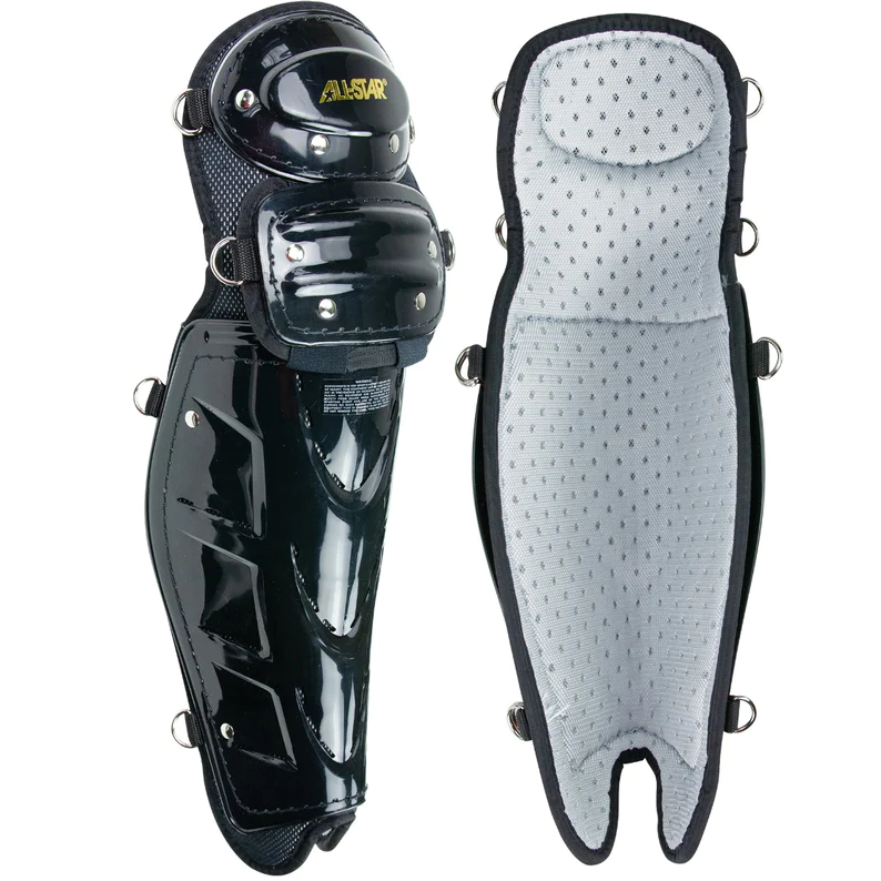 The All Star Cobalt Pro Umpire Leg Guards (LGU5000) are shown in black. One highlights the hard outer shell, while the other displays a padded, light gray interior with ventilation holes for comfort and breathability.