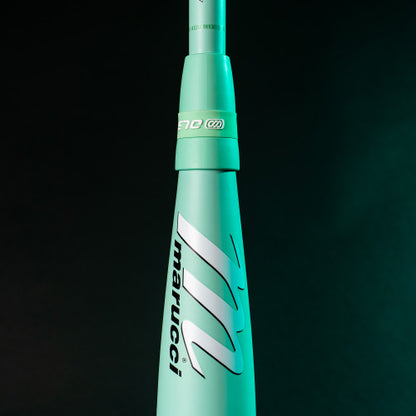 Close-up of the 2025 Marucci ASURA (-9) Fastpitch Softball Bat: MFPAS9 (DEMO) in teal stands vertically against a dark background, displaying the Marucci logo and Gap Sync barrel technology clearly on the barrel.