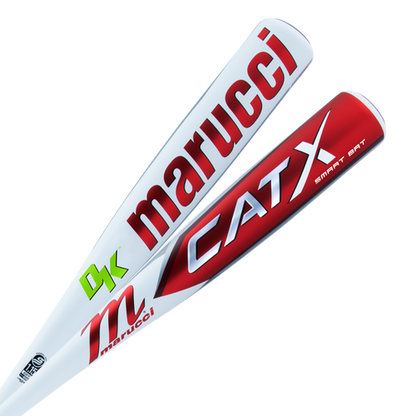 Two white Marucci baseball bats are shown: one has a red Marucci label, and the other is a 2024 CATX SMART (-5) USSSA bat (model MSBCXS5) with red and silver accents, featuring a built-in Diamond Kinetics sensor for top performance.