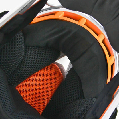 Close-up view of the interior of the All Star PHX Paige Halstead MVP Pro Lite Hockey Style Catcher’s Helmet (MVP-5-PHX-LT) by All Star, featuring black padded lining, orange support elements, and breathable mesh material for enhanced comfort and ventilation.