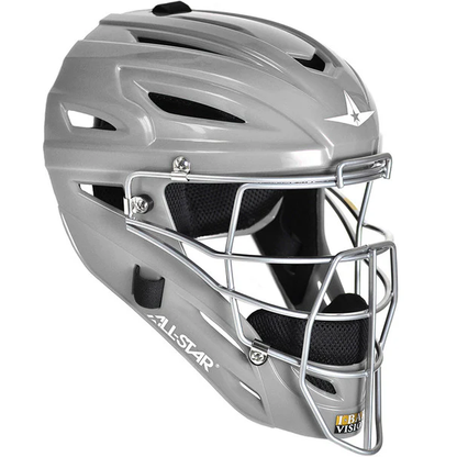 The All Star System7 Hockey Style Catcher's Helmet: MVP2500/MVP2510 is a high-impact resistant helmet featuring a metal faceguard, black inner padding, ventilation slits, and All Star logos on the side and front.
