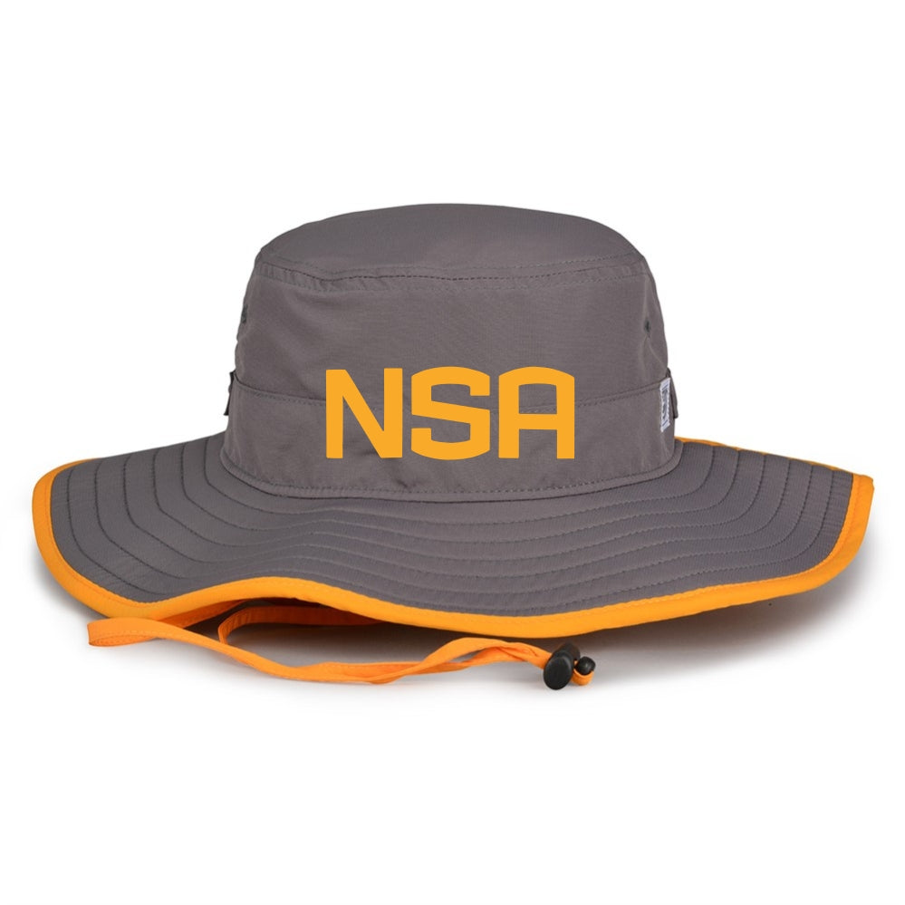 The Game Headwear NSA Classic Series Bucket Hat: GB400 is a gray wide-brim hat with orange trim, chin strap, and large yellow NSA letters on the front, offering stylish sun protection.