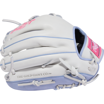 The Rawlings Liberty Advanced 12" Fastpitch Softball Glove (RLA206SB-2WPE) features a white and light blue design with pink accents, THE GOLD GLOVE CO.™ on the thumb, and is displayed against a plain white background.