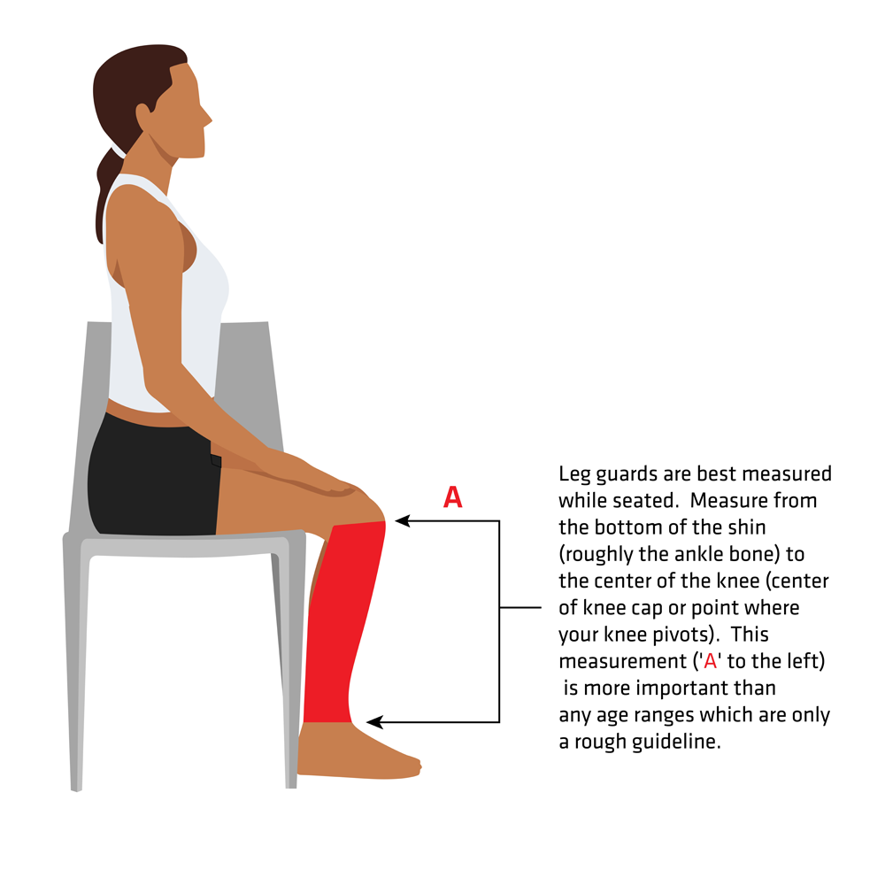 A woman sits on a chair, wearing All Star PHX Paige Halstead Fastpitch Catcher's Leg Guards: LGW-PHX, which feature the advanced LINQ hinge system for superior mobility.
