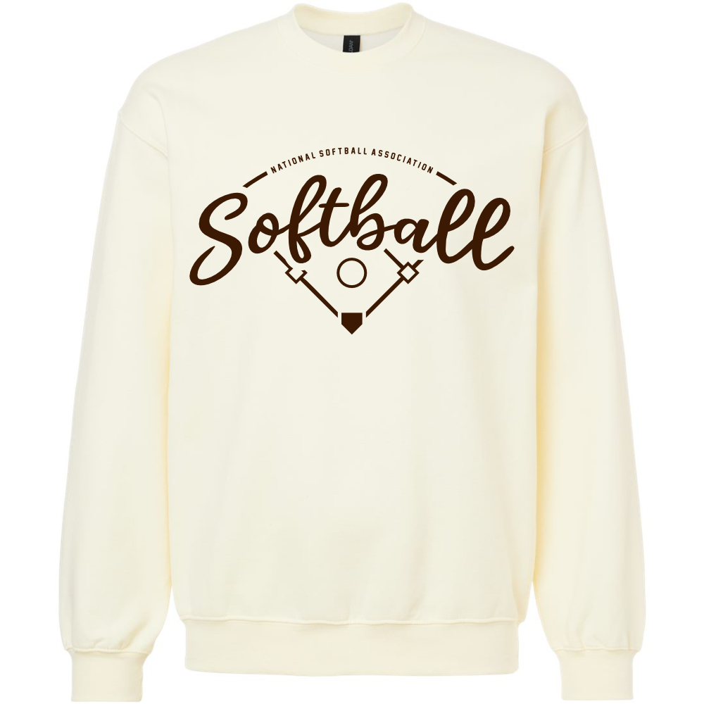 The DSG Apparel NSA Vintage Softball Crewneck Sweatshirt features a cream color, brown "Softball" and "National Softball Association" script, a simple field graphic with bases and bats, and is made from soft ring spun cotton.