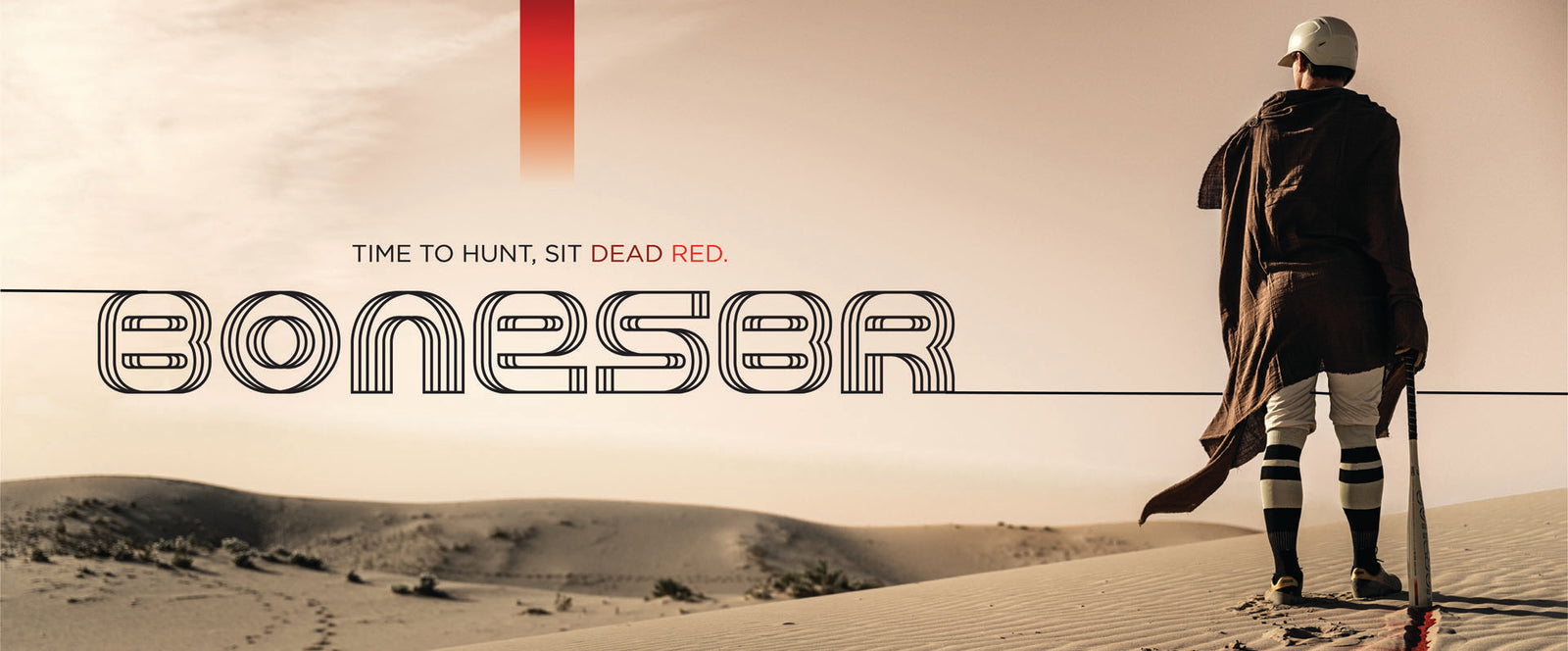A person in a cape and helmet stands in a desert holding a staff. The text reads, TIME TO HUNT, SIT DEAD RED. BONESBR. The sky is hazy with warm tones and sand dunes stretch into the distance.