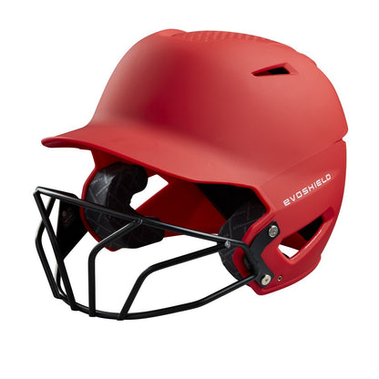 The EvoShield XVT Matte Batting Helmet with Fastpitch Mask (WTV7135) is shown in red with a black facemask and NOCSAE protection, pictured from a front-side angle on a white background.