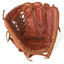 The Shoeless Joe 11.5" Baseball Glove: 1150MT is an infield glove from Shoeless Joe, featuring visible stitching and laces. The open palm displays the brand logo along with printed text.