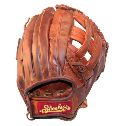 A heavily used Shoeless Joe 11.75" Baseball Glove (1175HW) by Shoeless Joe, crafted from tobacco tanned steerhide with visible stitching, an open web design, and a red “Shoeless” patch near the wrist.