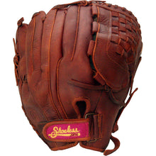 The Shoeless Joe 12.5" Fastpitch Glove (1250FPBW) is a brown leather fielder's glove with a woven web and a pink and yellow Shoeless brand label on the adjustable wrist strap.