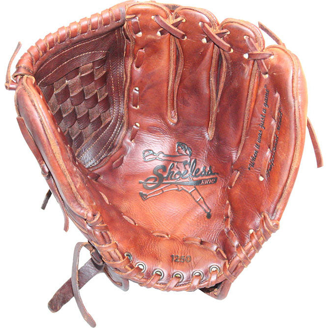 The Shoeless Joe 12.5" Fastpitch Glove (1250FPBW) features brown leather with laces, a woven pocket, the Shoeless Joe logo, a baseball player illustration in the palm, and an adjustable wrist strap for a secure fit.