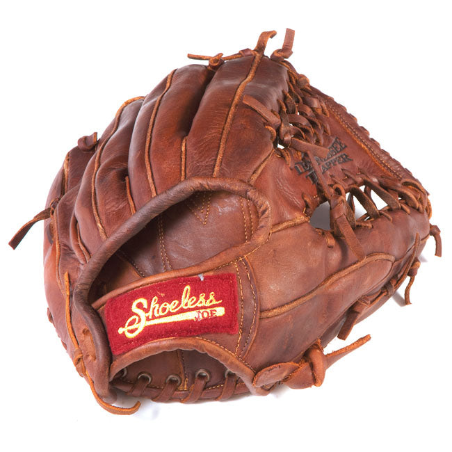 A well-worn Shoeless Joe 12.5" Baseball Glove (1250TT), with prominent stitching, laces, and a red Shoeless Joe patch on the thumb—showcasing classic craftsmanship from the Shoeless Joe brand.