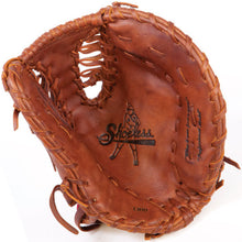 The Shoeless Joe 13" Baseball First Base Mitt (1300FBTT) is a brown leather glove with visible laces and "Shoeless Joe" stamped on the palm, ideal for players wanting a professional-quality mitt.