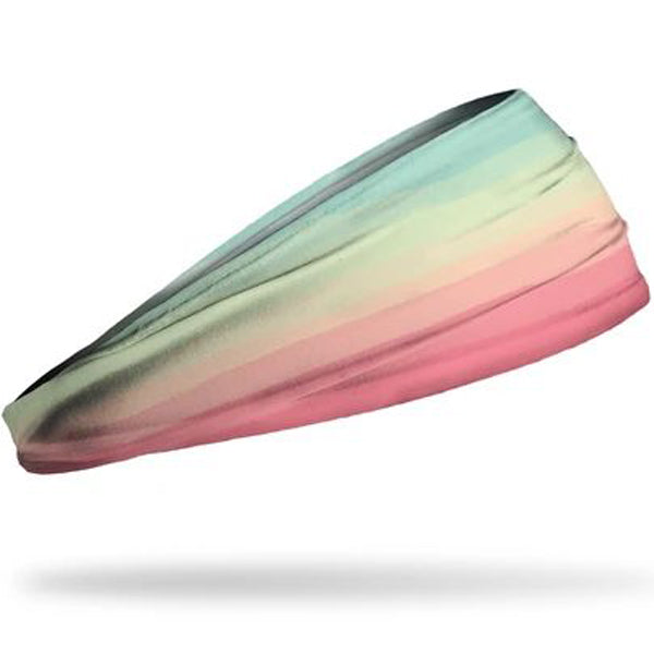 The Junk Boca Headband by Junk features a colorful gradient design and is made from technical t-shirt fabric for superior comfort and sweat wicking during workouts.