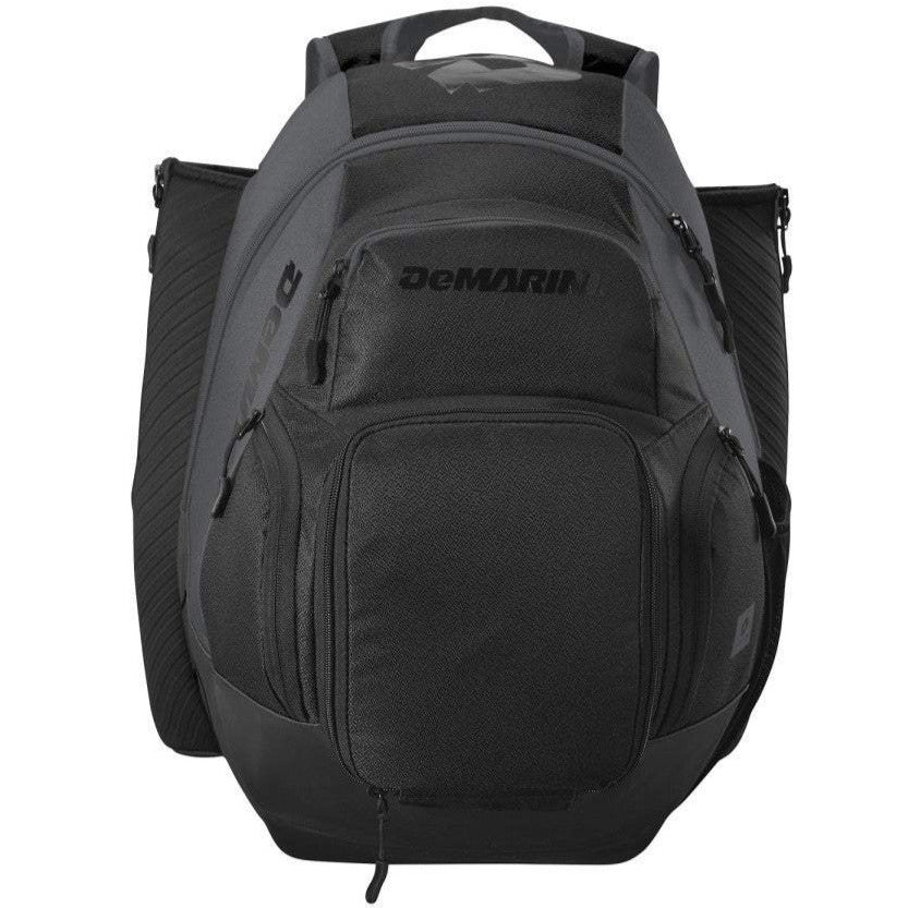 The DeMarini Voodoo OG Backpack (WB57117) is a black baseball backpack featuring multiple zippered compartments, side bat sleeves, and a top carrying handle, shown on a white background.