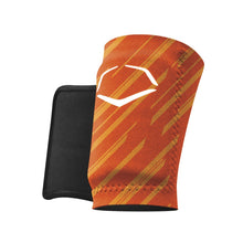 The EvoShield Speed Stripe Wrist Guard (WTV2045150) by EvoShield is orange and red with diagonal stripes and a white geometric logo, featuring custom molding technology, shown on a plain white background.