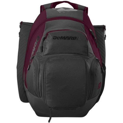 The DeMarini Voodoo OG Backpack: WB57117 is a dark gray and maroon baseball backpack with multiple zippered compartments, shoulder straps, and a top handle—ideal for carrying sports equipment.