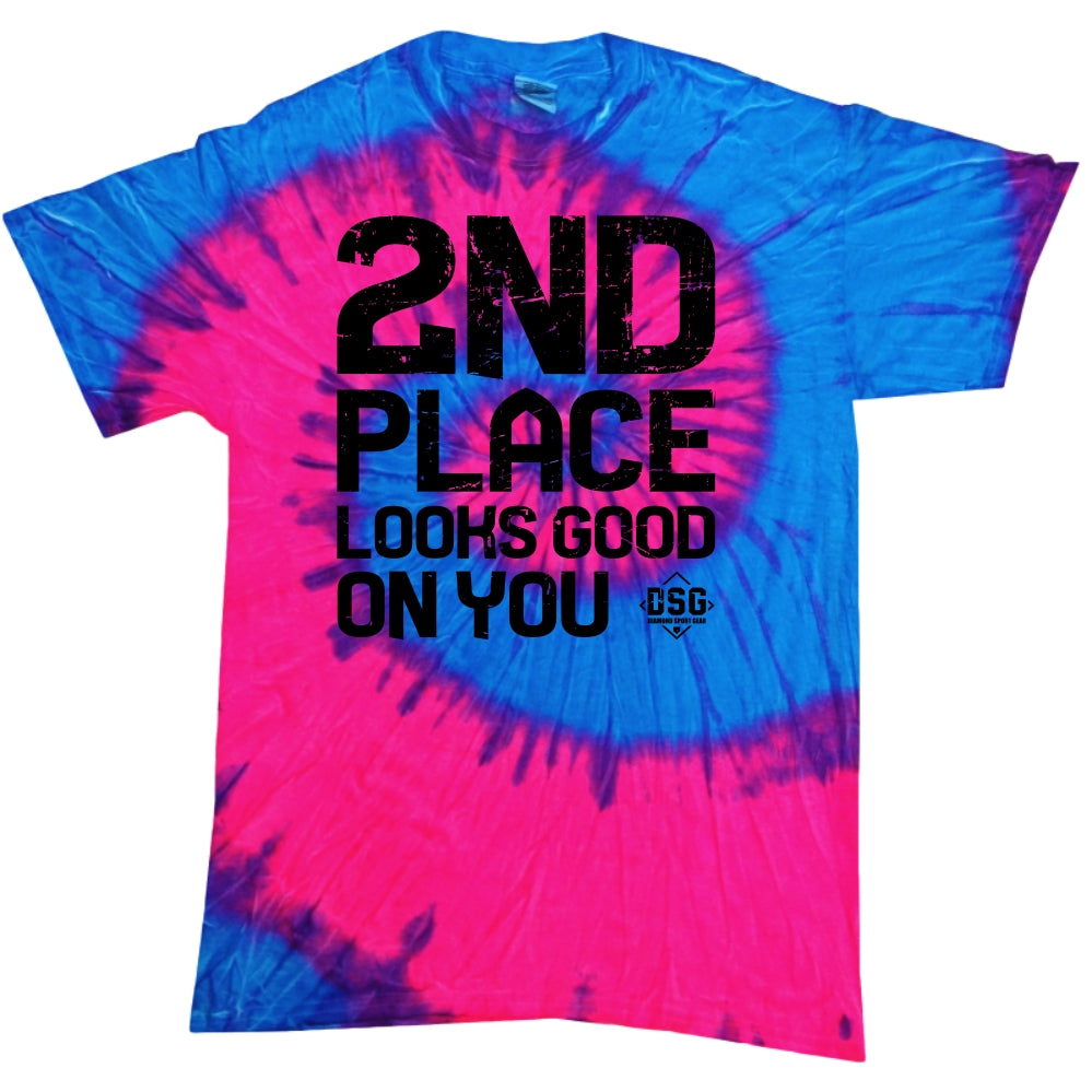 The DSG Apparel 2nd Place Looks Good on You T-Shirt (DSG-2ND) features a classic fit in blue and pink tie-dye, bold black "2ND PLACE LOOKS GOOD ON YOU" text, a small DSG logo, and is made from pre-shrunk cotton for comfort.