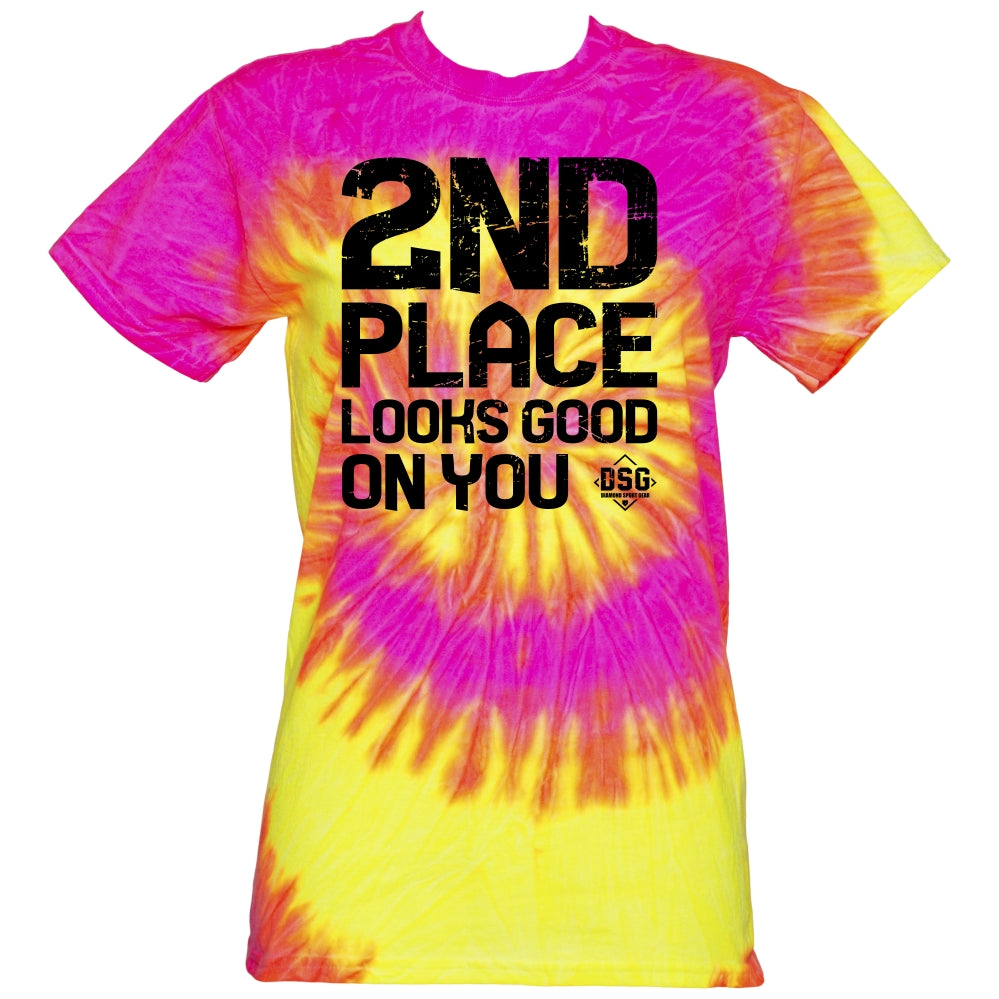 The DSG Apparel 2nd Place Looks Good on You T-Shirt features a classic fit, tie dye in pink, yellow, and orange with bold black "2ND PLACE LOOKS GOOD ON YOU" text. Made from pre-shrunk cotton for lasting comfort.