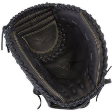 A Mizuno MVP Prime 34" Fastpitch Catcher's Mitt (GXS50PF3) in black with tan stitching, seen from above, highlights its deep pocket and webbing crafted from Bio Soft Leather.