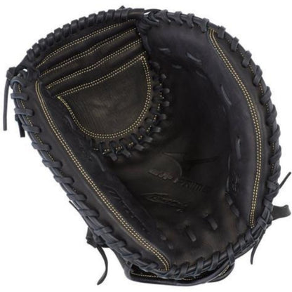 A Mizuno MVP Prime 34" Fastpitch Catcher's Mitt (GXS50PF3) in black with tan stitching, seen from above, highlights its deep pocket and webbing crafted from Bio Soft Leather.