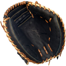 A close-up of the Mizuno Prospect Select Samurai 33" Baseball Catcher's Mitt (GXC95Y3) shows its black leather build, tan lacing, and detailed stitching, with the Mizuno logo embossed on the palm for trusted thumb protection.
