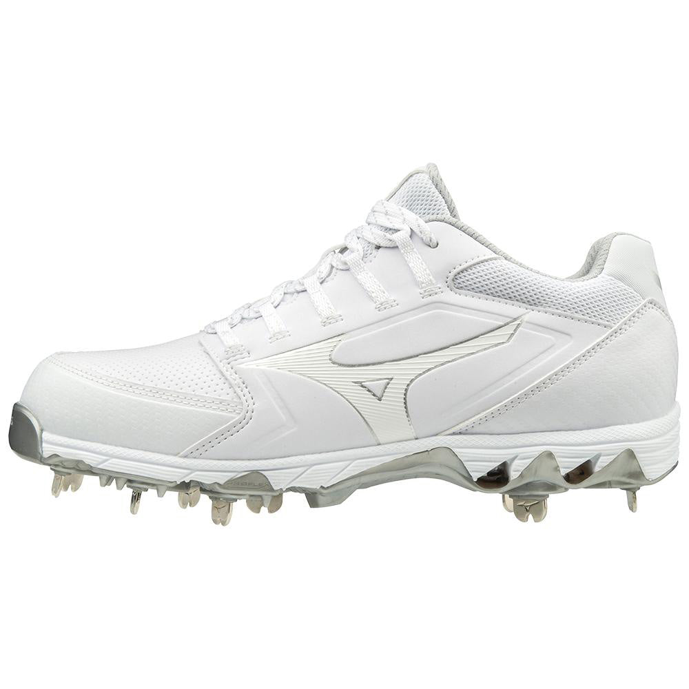 The Mizuno 9-Spike Swift 6 Women's Low Metal Fastpitch Softball Cleats (320588) feature a white mesh and synthetic upper, lace-up closure, subtle silver accents, and metallic spikes—ideal for speed and agility on the field.