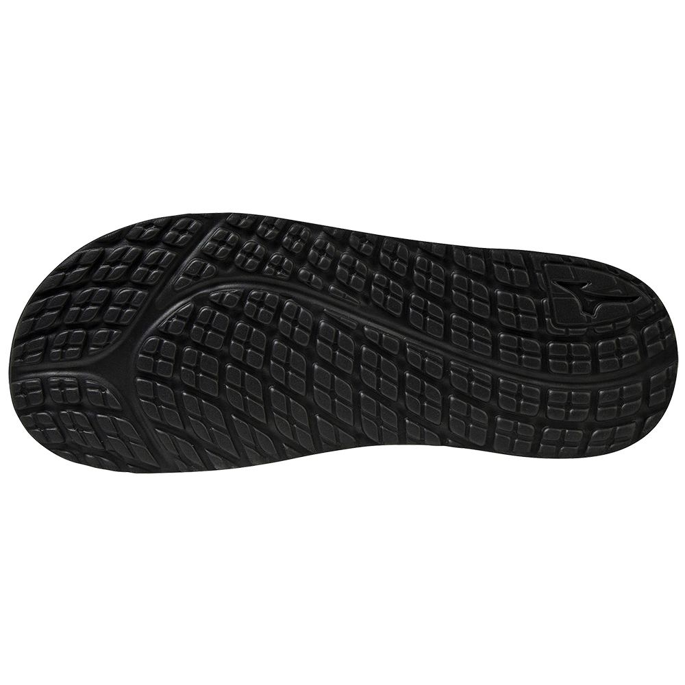 The image shows the Mizuno Relax Slide 2 Adult Slides (320629) by Mizuno, featuring a black rubber outsole with textured, grid-like tread and curved grooves for grip, plus a cushioned EVA midsole for comfort and support.
