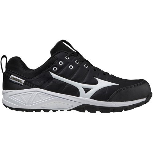 The Mizuno Ambition 2 All Surface Low Men's Turf Shoes (320632) feature a black design with a white sole, bold Mizuno logo, black laces, visible stitching, and white accents. Enhanced traction delivers grip for multi-sport use on any surface.