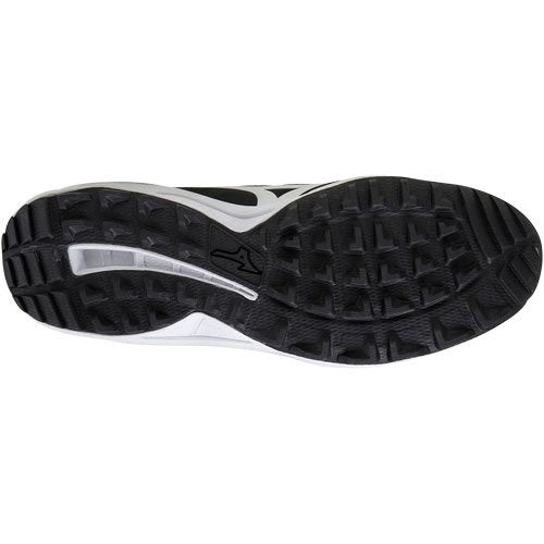 The image shows the black rubber outsole of Mizuno Ambition 2 All Surface Low Men's Turf Shoes, featuring a textured tread for traction and a small Mizuno logo near the center.