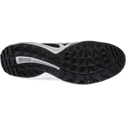 The image shows the black rubber outsole of Mizuno Ambition 2 All Surface Low Men's Turf Shoes, featuring a textured tread for traction and a small Mizuno logo near the center.