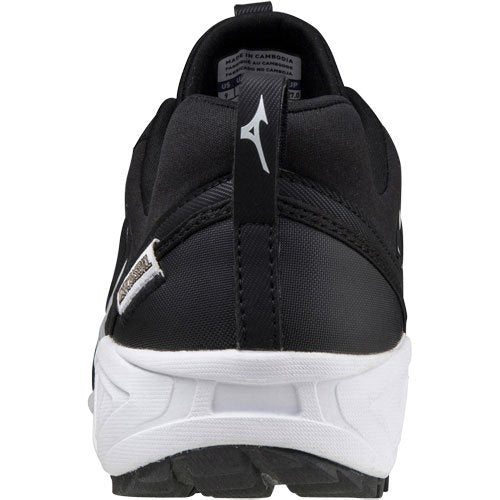 A rear view of the Mizuno Ambition 2 All Surface Low Men's Turf Shoe shows its black design with a white sole, a small white heel logo, and a side label near the heel, built for all-surface performance.