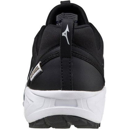 A rear view of the Mizuno Ambition 2 All Surface Low Men's Turf Shoe shows its black design with a white sole, a small white heel logo, and a side label near the heel, built for all-surface performance.