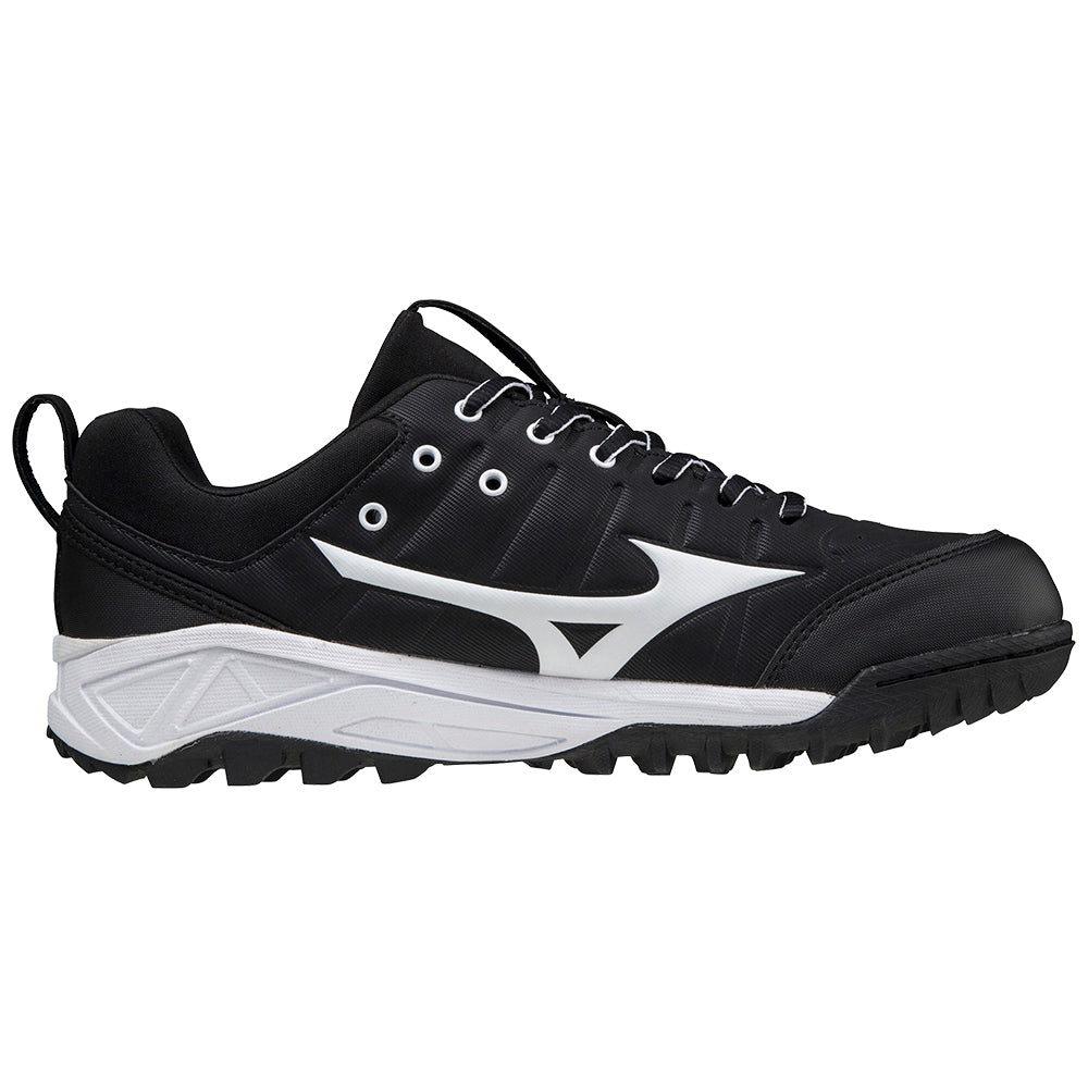 The Mizuno Ambition 2 All Surface Women's Turf Shoes (320640) feature a black and white design, thick textured sole with multi-directional studs, white side logo, white accents, and black laces—perfect for sports or outdoor activities.